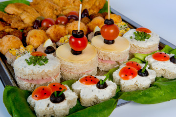 plate with meat, meatballs, vegetables, cheese, spices and bread