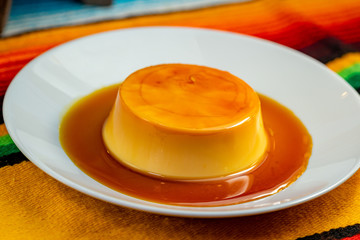 Traditional Flan Dessert on White plate