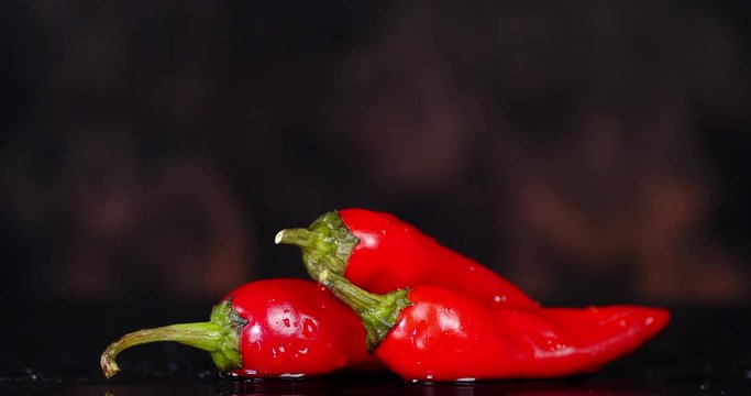 Red chili pepper with flames of fire.