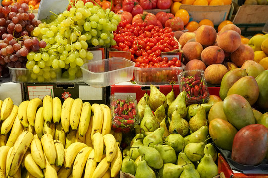 Fruits display (Banana,Pear,Mango,Peach,Grape)  in BArcelona market