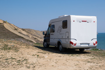 A house on wheels. The motorhome. Camping. Outdoors. A wild kind of getaway. Rv.