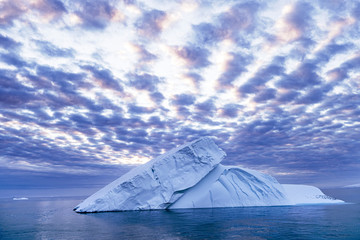 Floating iceberg in the antarctic ocean