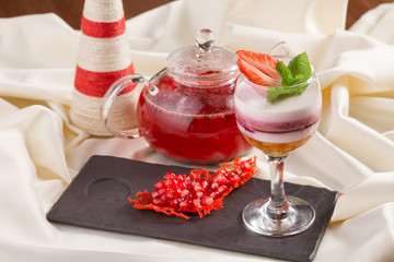 Delicious strawberry sweet cream cheese deserts in glass