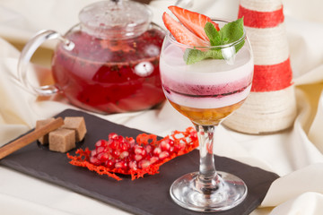 Delicious strawberry sweet cream cheese deserts in glass