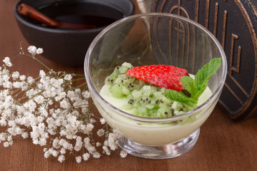 A Fresh dessert lemon mousse and kiwi