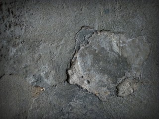 cracked cement covered with gray cement surface as background for design