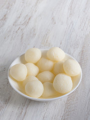 indian traditional sweet rasgulla, close up, copy space