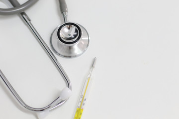 Stethoscope isolated equipment on white texture with blurred background