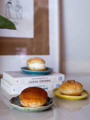 Cafe vibe, Decorated with sweet doughnuts in colourful ceramic wares .