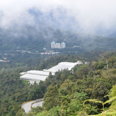 A view of buildings from the top of Genting highland, Foggy view of Genting Highlands outdoor theme...