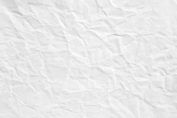 Obraz premium Crumpled white paper background texture