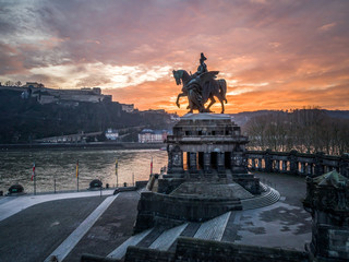 Colorful Sunrise burning sky Koblenz City historic monument German Corner where river rhine and...