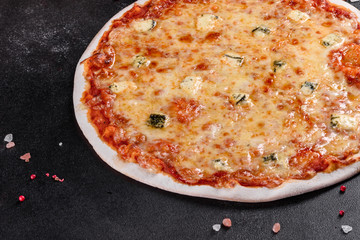 Delicious fresh oven cooked pizza four cheeses