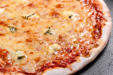 Delicious fresh oven cooked pizza four cheeses