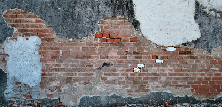 Full Frame Shot Of Damaged Brick Wall