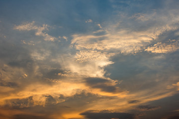 Fototapeta na wymiar Clouds sky golden light evening sky