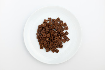 Chocolate cereal on white background