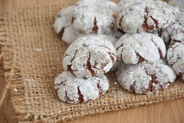 Closeup of chocolate biscuit cookies on wooden table