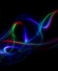 Abstract colored lights curves, frozen light, blue freeze light made with long exposure, black background