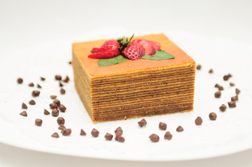 Traditional Malaysian Dessert Kek Lapis Sarawak or Sarawak layered cake on isolated white...