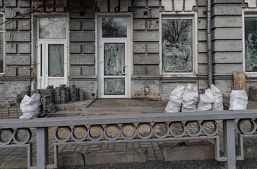 detail of the facade of a building. City of Kiev under construction repair of buildings. Architecture of European city.