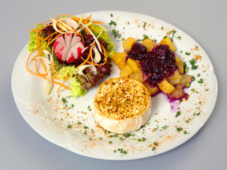 Grilled cheese with roasted pumpkin, cranberry jam and vegetable salad.