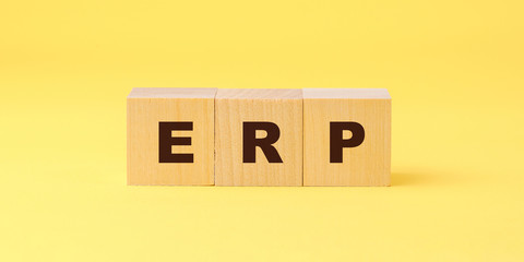 acronym erp enterprise recource planning text on wooden blocks business software concept