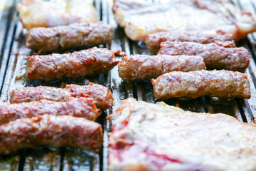 Meatballs with pork meat on the barbecue