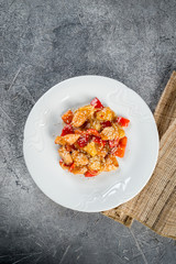 Sliced fried turkey with sesame garnished vegetables