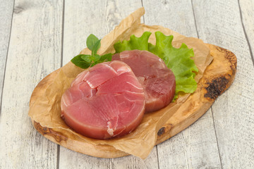 Raw tuna round steak for grill