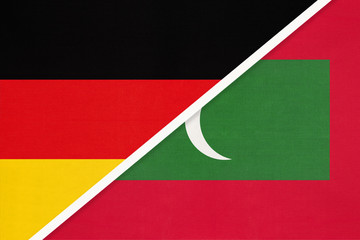 Germany vs Maldives, symbol of two national flags. Relationship between European and Asian countries.