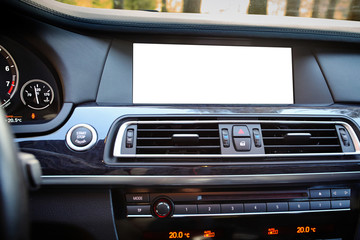 Obraz premium Monitor in car isolated blank screen for navigation maps and GPS rearview camera and parking assistant. Isolated on white with clipping path. Car display blank screen mock up copy space.