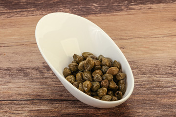 Tasty capers in the bowl