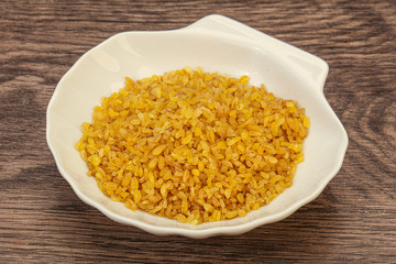 Vegetarian cuisine - dry bulgur for cooking