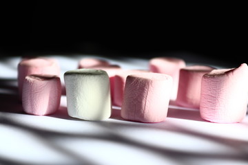 close up of pink and white thread