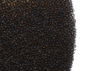 Black sponge texture background close up