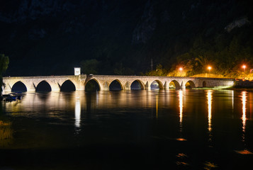 Fototapeta na wymiar The Ottoman Mehmed Pasa Sokolovic Bridge in Visegrad, Bosnia and Herzegovina during night