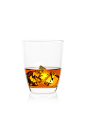 Glass of whiskey with ice isolated on white background.