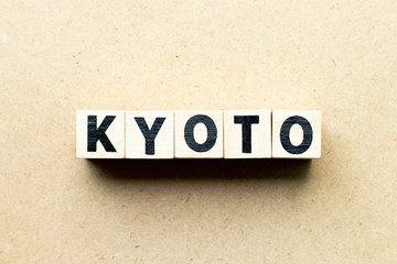 Letter block in word Kyoto on wood background