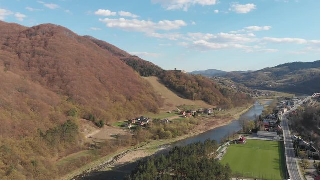 Beskids Mountains and Poprad River in spring. Village Rytro, Poland.