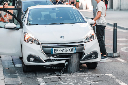 12 July 2018, Barcelona, Spain: Carefree driver made a mistake when entering a paid Parking lot and got into an accident with an automatic barrier pillar. Parking violations and car insurance