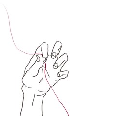 白背景に赤い糸（紐）を摘んだ指（手）