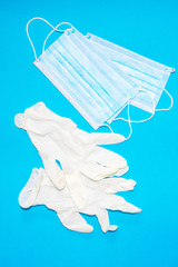 close-up of facemasks and surgical gloves