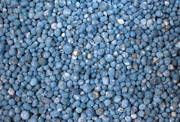 fotografia close up de textura fertilizante agricola quimico de urea de color azul para fondo de pantalla