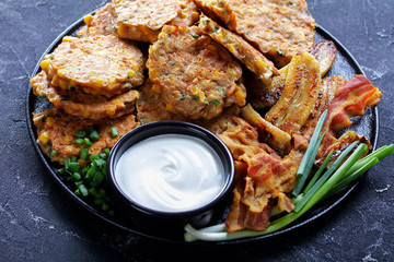 corn pancakes with fried banana and bacon