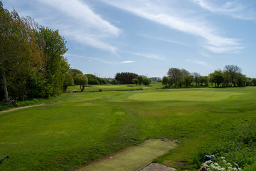 View of the short a par 3 hole number 16 at Littlehampton golf course.