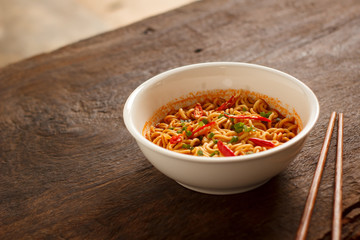 Instant noodles placed on a wooden table