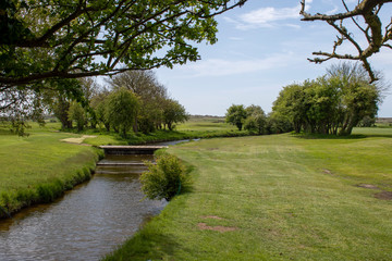 Scenic view over the stream on a short par 3 at Littlehampton golf course.