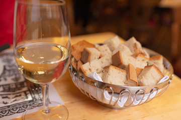 White wine and bread at dinner.