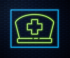 Obraz premium Glowing neon line Nurse hat with cross icon isolated on brick wall background. Medical nurse cap sign. Vector Illustration